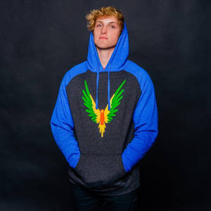 Caption: Logan Paul, A Significant Online Influencer, In A Candid Shot. Wallpaper