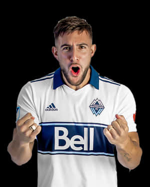 Caption: Lucas Cavallini Celebrating Victory On A White Background Wallpaper