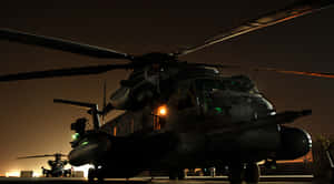 Caption: Majestic Sikorsky Ch-53e Super Stallion Helicopter Model Wallpaper