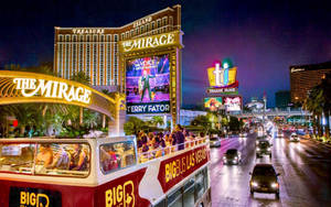 Caption: Nightlife Vibrance On The Las Vegas Strip Wallpaper