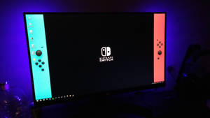 Caption: Nintendo Switch Gaming On Computer Monitor Wallpaper
