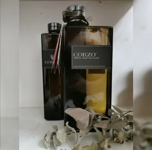 Caption: Premium Corzo Anejo Tequila Bottles Wallpaper