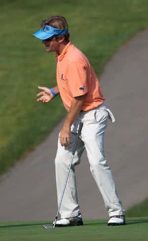 Caption: Professional Golfer Brett Quigley Focused On The Course Wallpaper