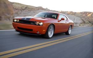 Caption: Roaring Power - 2008 Dodge Challenger Srt8 Wallpaper