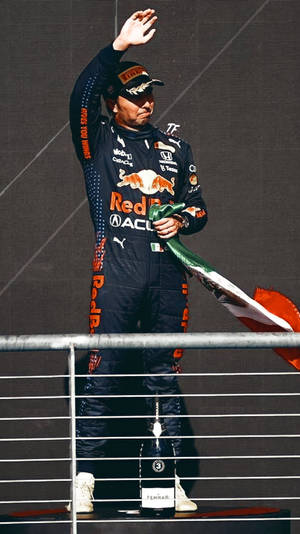 Caption: Sergio Perez Waving To Fans Wallpaper