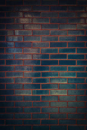 Caption: Striking Texture Of A Dark Brick Wall Wallpaper