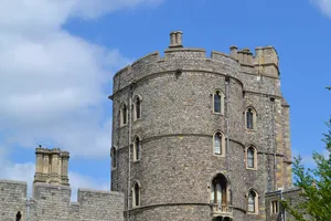 Caption: Stunning Prospect Of Windsor Castle Against Azure Skies Wallpaper