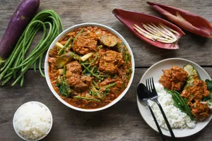 Caption: Sumptuous Kare-kare Filipino Stew - A Taste Of Authenticity Wallpaper