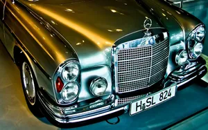 Caption: Timeless Elegance: An Old Mercedes Benz Car Wallpaper