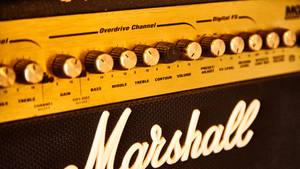 Caption: Up Close And Personal With A Marshall Amplifier Wallpaper