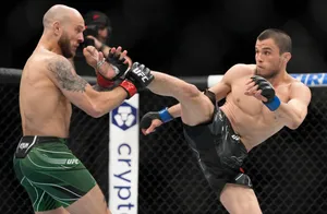 Caption: Young Mixed Martial Arts Star, Umar Nurmagomedov In Action Wallpaper