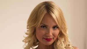 Captivating Kristin Chenoweth Posing Elegantly Wallpaper