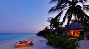 Captivating Night At The Beach Resort Wallpaper