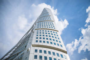 Captivating Turning Torso Skyscraper Against The Sky Wallpaper