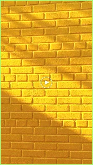 Capturing The Past's Charm - Yellow Vintage Aesthetic Brick Wall Wallpaper