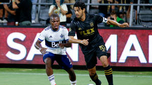 Carlos Vela Against Vancouver Whitecaps Wallpaper