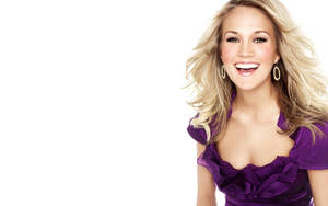 Carrie Underwood In Purple Dress Wallpaper
