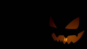 Cartoon Halloween Glowing Pumpkin Wallpaper