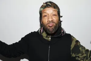 Casual Manin Camoand Black Outfit Wallpaper