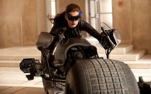 Catwoman Riding The Batpod Wallpaper