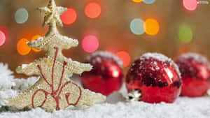 Celebrate Christmas With A Festive Ornament Wallpaper