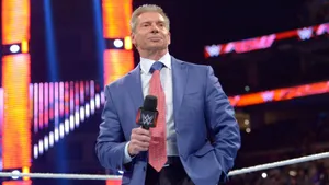 Ceo Vince Mcmahon In Blue Suit Wallpaper