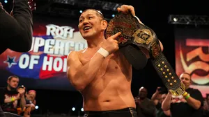 Champion Wrestler Minoru Suzukiwith Belt Wallpaper