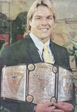 Champion Wrestlerwith Belts Wallpaper