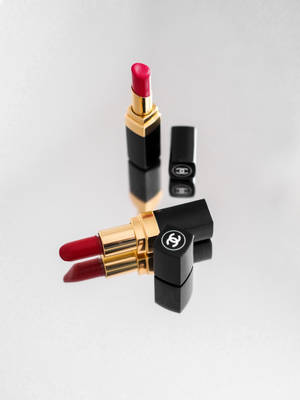 Chanel Red Lipsticks Mirror Reflection Wallpaper