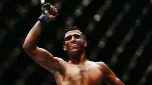 Charles Oliveira Fist Pump Victory Wallpaper