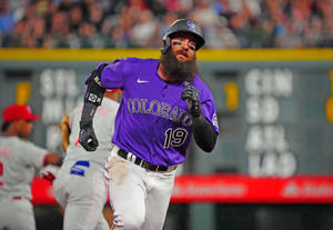 Charlie Blackmon In Purple Uniform Wallpaper