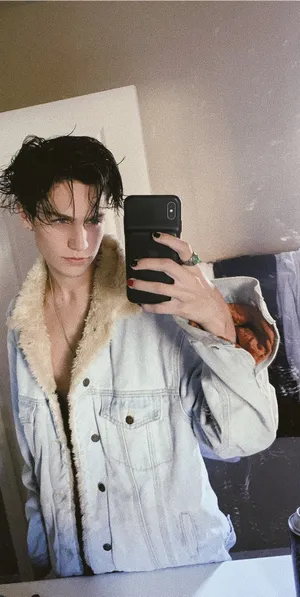 Chase Hudson Poses For A Picture Wallpaper