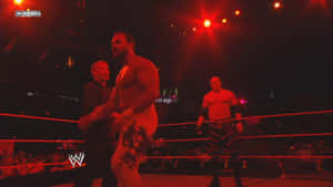 Chavo Guerrero Faces Off Against Cain In An Electrifying Wrestling Match Wallpaper