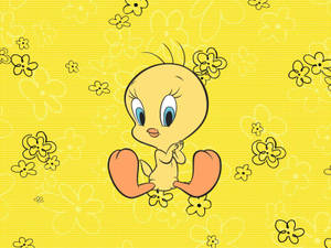 Cheerful Tweety In Vibrant Yellow Floral Background Wallpaper