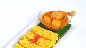 Chicken Yellow Curry And Roti Jala Wallpaper