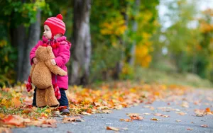 Child Holding Teddy Bear On The Road Autumn Wallpaper