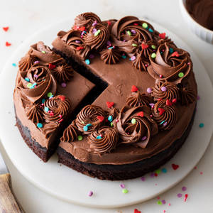 Chocolate Cake With Beautifully Shaped Icing Wallpaper