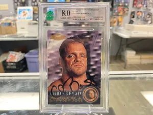 Chris Benoit Posing With Championship Belt Wallpaper