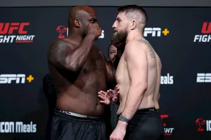 Chris Daukaus And Derrick Lewis Face-to-face Wallpaper