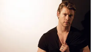 Chris Hemsworth In A Black Shirt Wallpaper