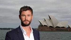 Chris Hemsworth Soaking Up The Australian Sunshine Wallpaper