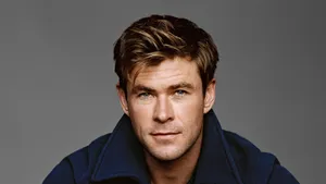 Chris Hemsworth Strikes A Pose In A Blue Jacket. Wallpaper