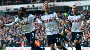 Christian Eriksen Cheering With Teammates Wallpaper