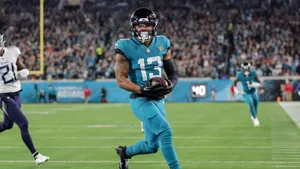 Christian Kirk Football Blue Green Jersey Wallpaper