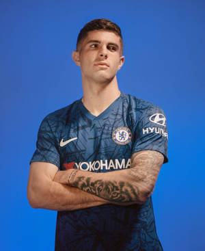 Christian Pulisic Crossed Arms Wallpaper