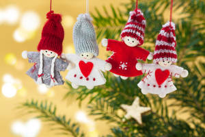 Christmas Angel Toys With Winter Clothes Wallpaper