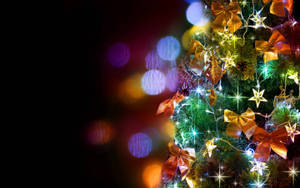 Christmas Tree With Ribbons, Stars, Christmas Lights Wallpaper