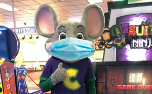 Chuck E Cheese Mascot With Mask Wallpaper