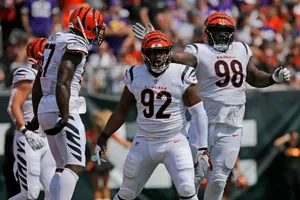 Cincinnati Bengals Defense Man Bj Hill Celebrating Nfl Game Wallpaper
