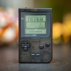 Classic 90s Game Boy With Tetris Game Wallpaper